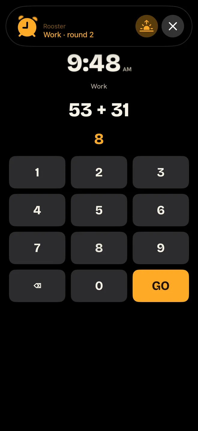 Rooster math mission screen asking 53 plus 31 before the alarm stops